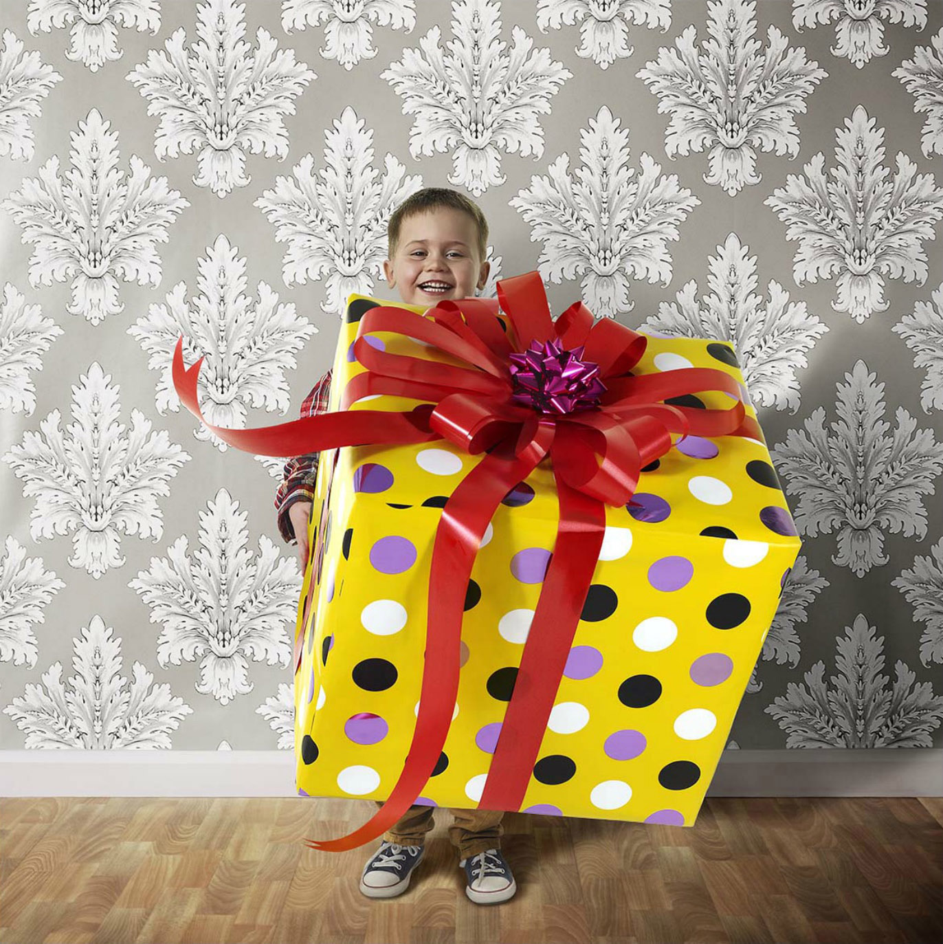 Boy Holding Great Big Gift